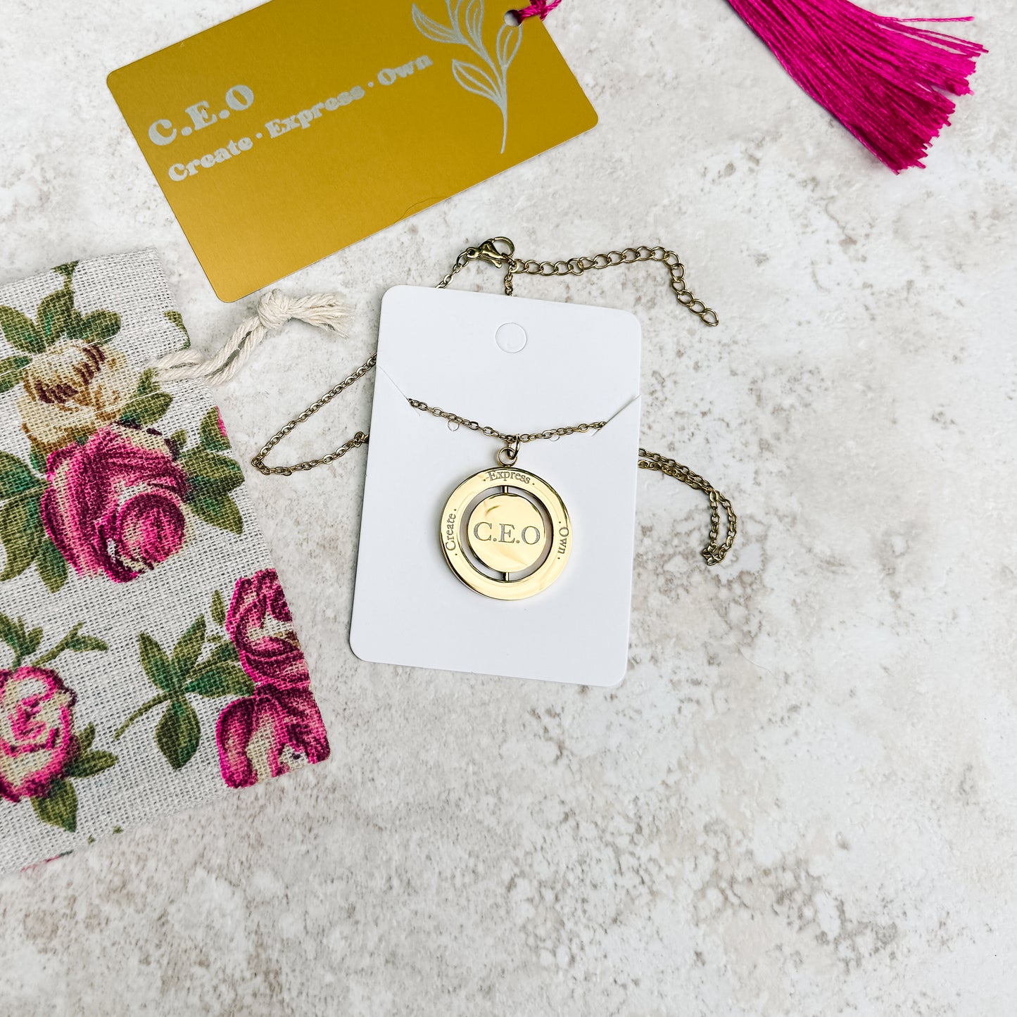 C.E.O Spinner Necklace (Stainless Steel) + Bookmark — Create • Express • Own