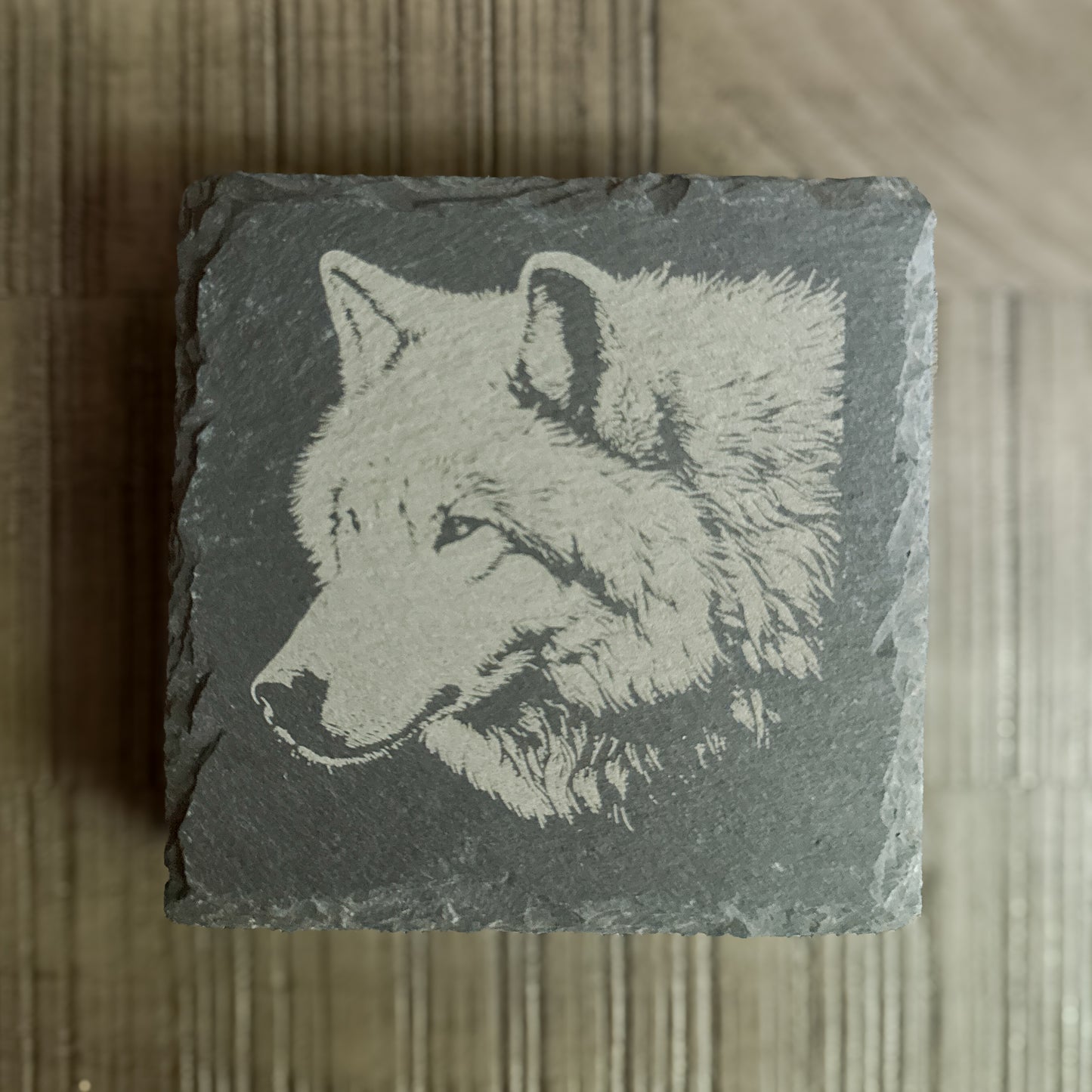 Engraved slate coaster with wolf profile – handcrafted wildlife home accent