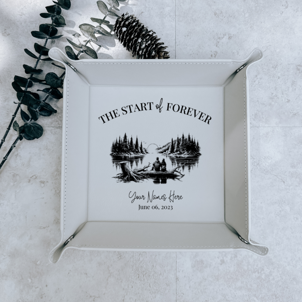 Decorative tray with 'The Start of Forever' design on a light gray surface.