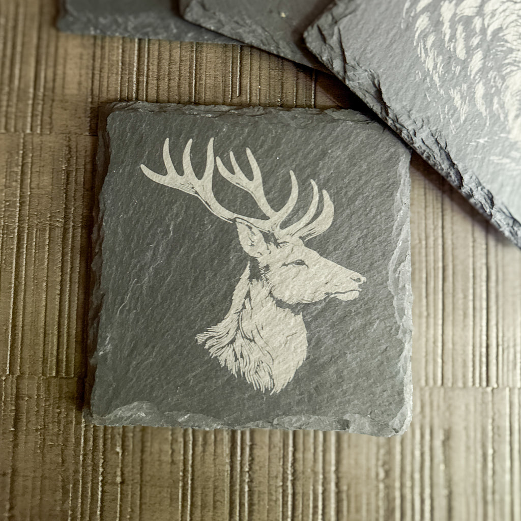 Slate coaster with engraved elk head profile – rustic wildlife drinkware