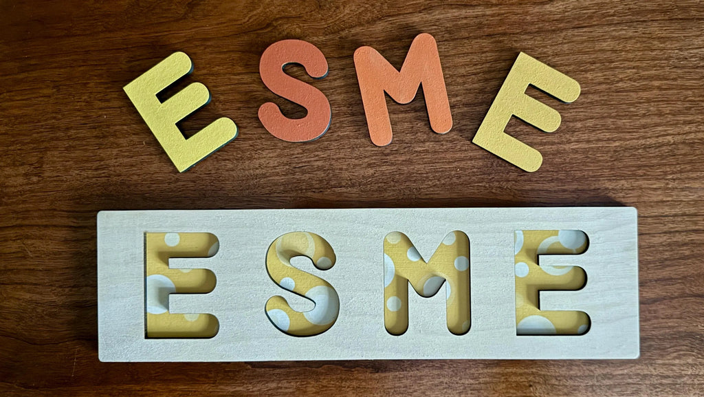 Personalized wooden name puzzle with colorful letters and yellow polka dot backing – custom toddler gift