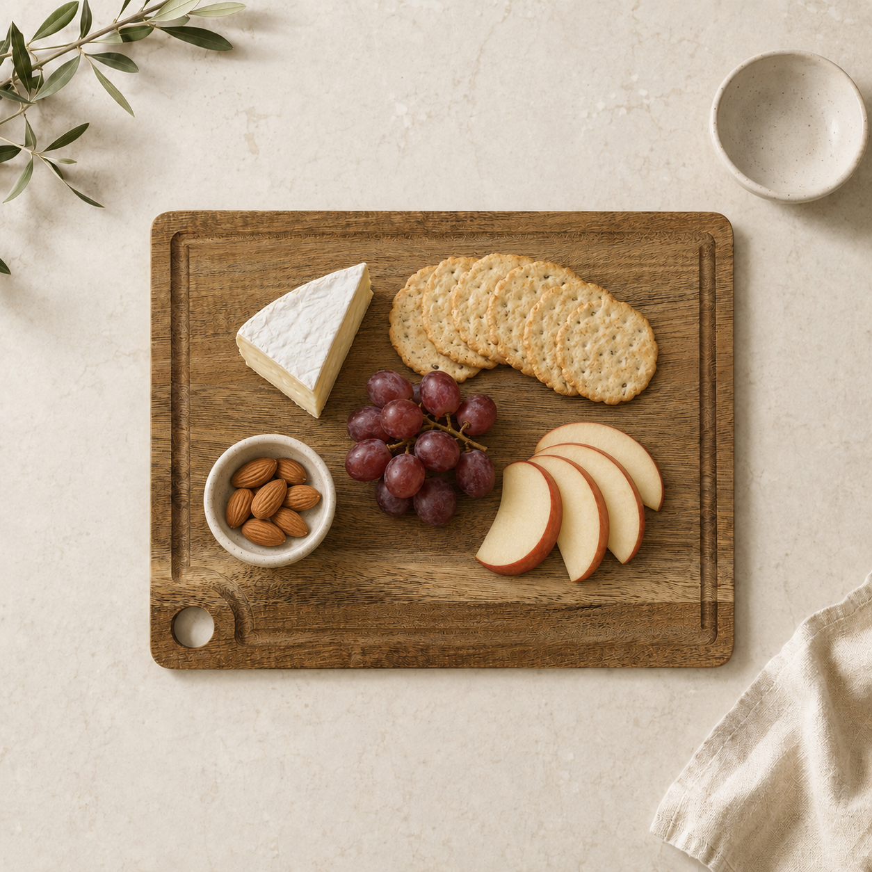 Small acacia cutting board styled as a charcuterie serving board for two